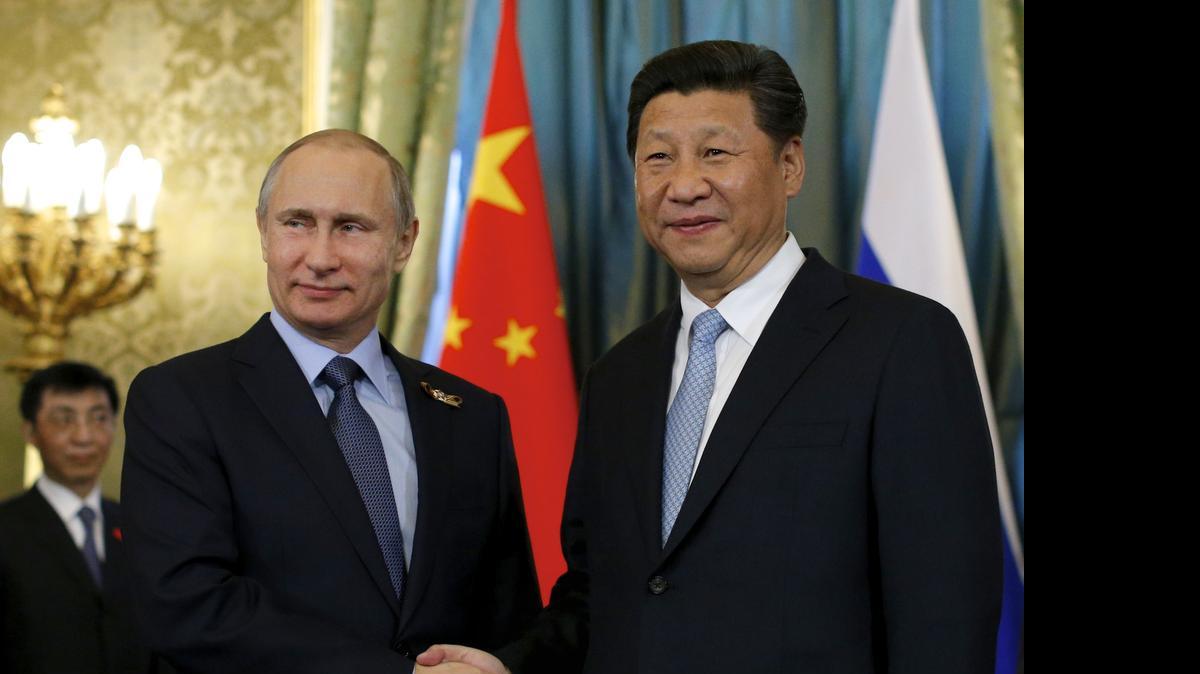 
Los presidentes de Rusia y China, Vladimir Putin y Xi Jinping en Moscú.
