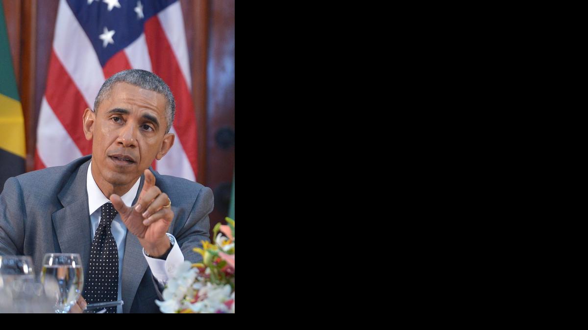 
El presidente estadounidense, Barack Obama, responde a una pregunta sobre Cuba durante una reunión bilateral con la primera ministra de Jamaica, Portia Simpson Miller en Jamaica House el jueves 9 de abril de 2015, en Kingston, Jamaica.
