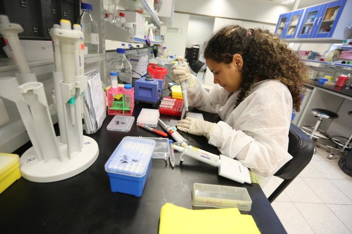 Mabel Cruz Rodriguez works in a lab at the Center for Molecular Immunology in Havana.