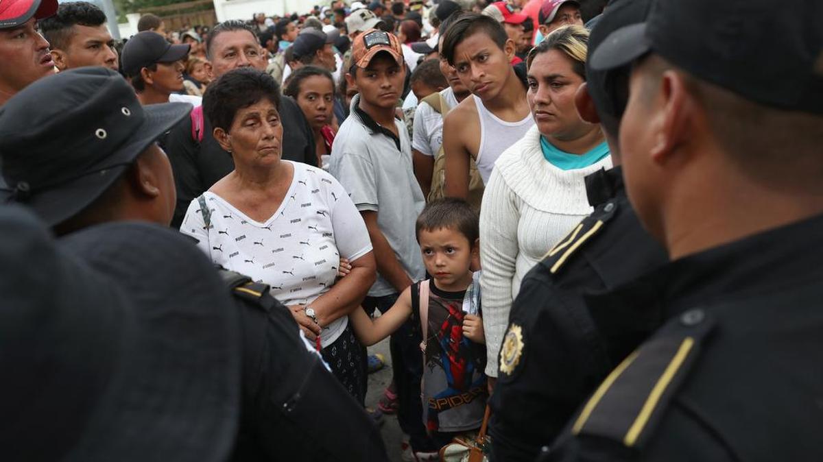 A caravan of more than 1,500 Honduran immigrants check in to their local authorities in Esquipulas, Guatemala.