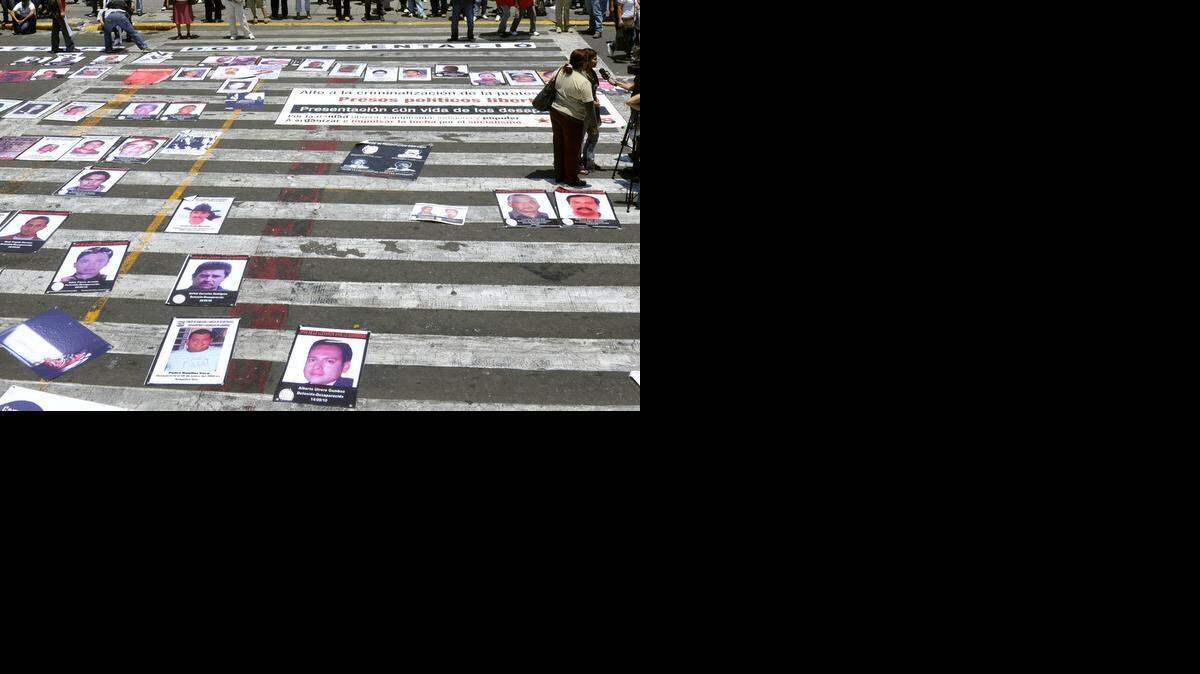 
Fotos de desaparecidos durante una protesta realizada por sus familiares en Ciudad de México, en el 2012.
