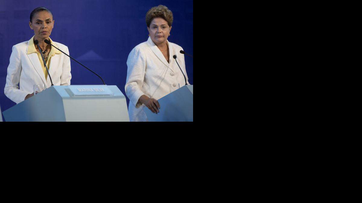 
Marina Silva, candidata presidencial del Partido Socialista Brasileño (izq.), y Dilma Rousseff, quien busca la reelección por el Partido de los Trabajadores, tienen un empate técnico en caso de ir a la segunda vuelta de los comicios de Brasil.

