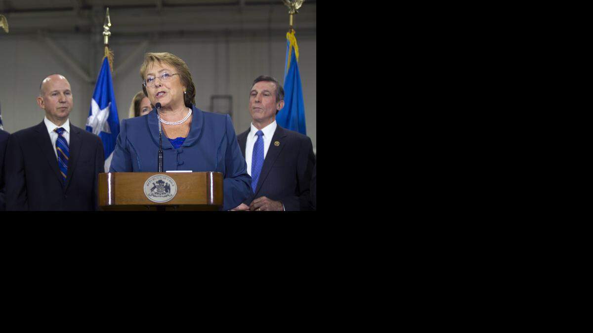 
La presidenta chilena Michelle Bachelet, centro, durante una conferencia de prensa en Delaware.


