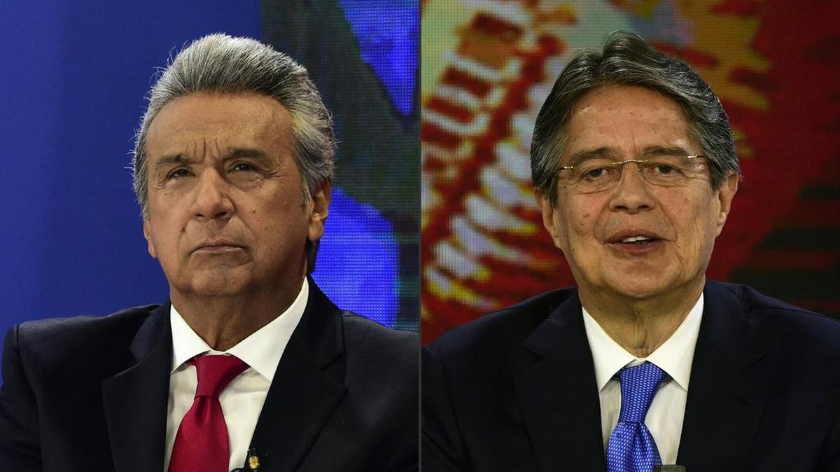 Esta combinación de imágenes muestra a los candidatos presidenciales ecuatorianos, Lenín Moreno y Guillermo Lasso, participando en un debate televisado en Quito el 5 de febrero de 2017.