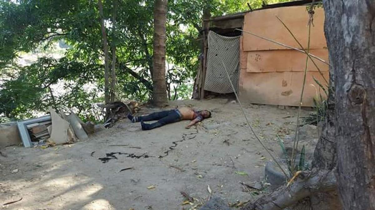 El cadáver del joven al que las maras le extrajeron el corazón, yace en las afueras de un cuartucho, en el oriente de El Salvador.