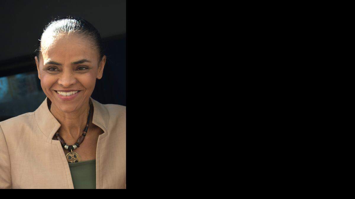 
Marina Silva, ex ministra de Medio Ambiente y candidata presidencial por el Partido Socialista Brasileño (PSB) a su llegada al Museo de Arte de Río (MAR) en Río de Janeiro, el 11 de septiembre de 2014.
