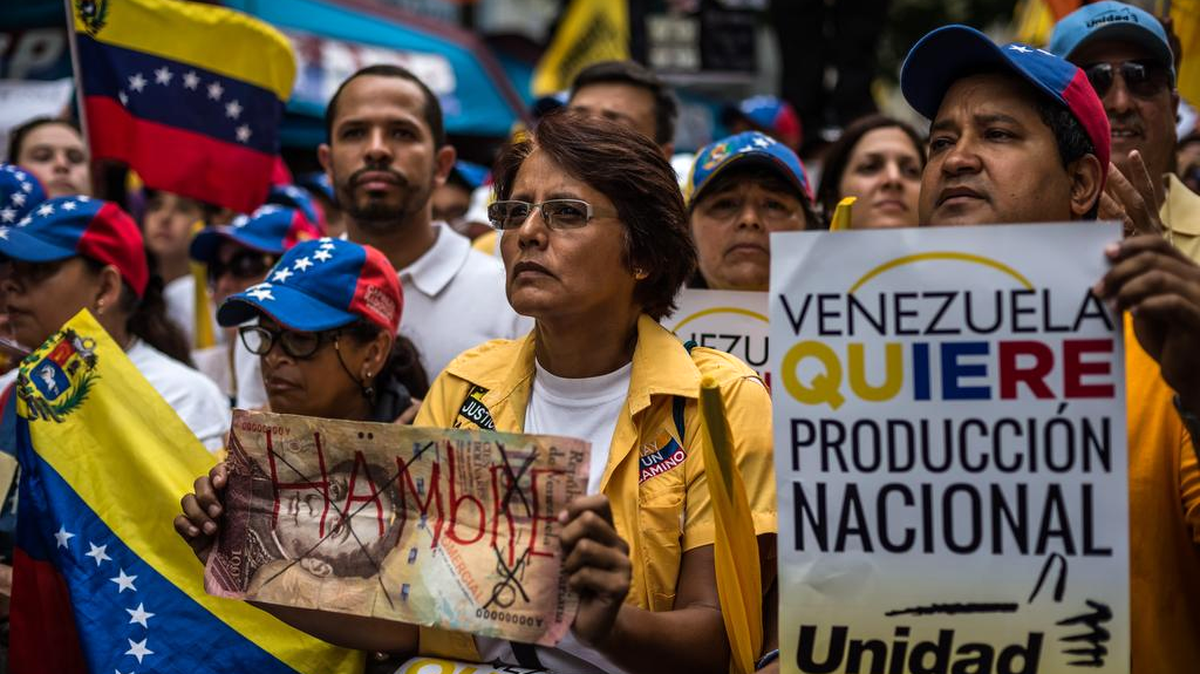 
Cientos de manifestantes protestan contra las políticas del gobierno de Nicolás Maduro, el pasado 19 de septiembre en Caracas.


