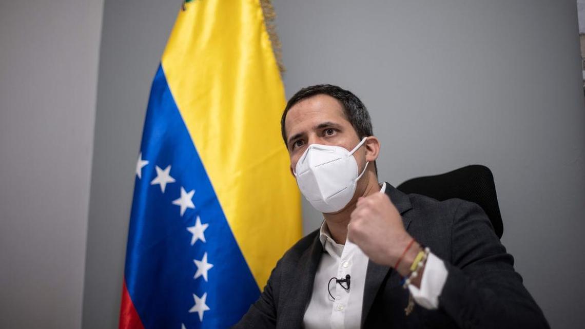 Venezuelan opposition leader and self-proclaimed acting president Juan Guaidó gestures during an interview with AFP at his home in Caracas on Nov. 30, 2020.