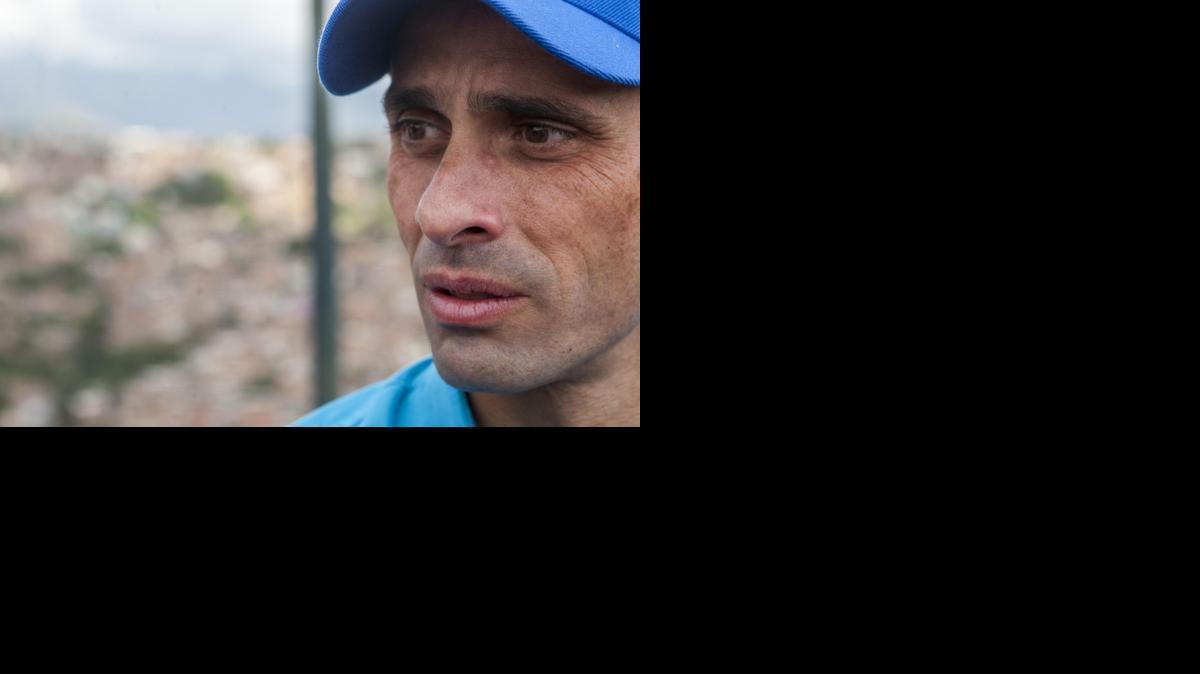 
El líder de la oposición y ex candidato presidencial Henrique Capriles participa en un acto de la Mesa de la Unidad Democrática (MUD) el viernes 23 de enero del 2015, en un barrio de Petare en Caracas.
