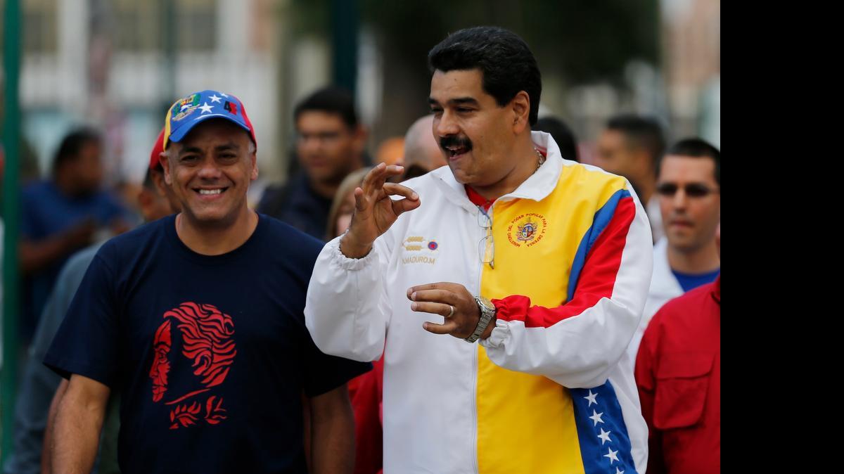 
El presidente venezolano, Nicolás Maduro, junto con el dirigente del PSUV, Jorge Rodríguez, en el 2013. El activista afirmó el lunes que “si hay un país garante de los derechos humanos es Venezuela”. 
