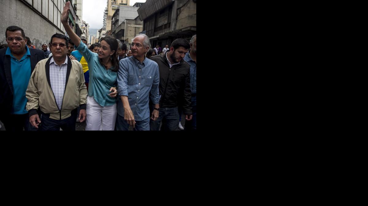 
 La ex diputada de la Asamblea Nacional (AN) y dirigente opositora María Corina Machado asiste a la Fiscalía venezolana hoy, miércoles 3 de diciembre de 2014, en Caracas (Venezuela). Machado compadece en calidad de imputada ante la Fiscalía por su supuesta relación con un plan magnicida contra el presidente venezolano, Nicolás Maduro. EFE/Miguel Gutiérrez
