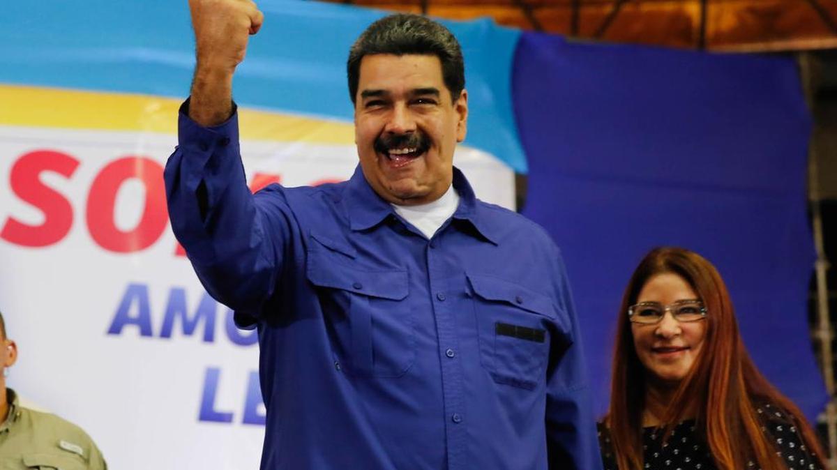El presidente Nicolás Maduro acompañado de su esposa Cilia Flores el 16 de noviembre del 2017, en la ciudad de Maracay, estado Aragua (Venezuela).