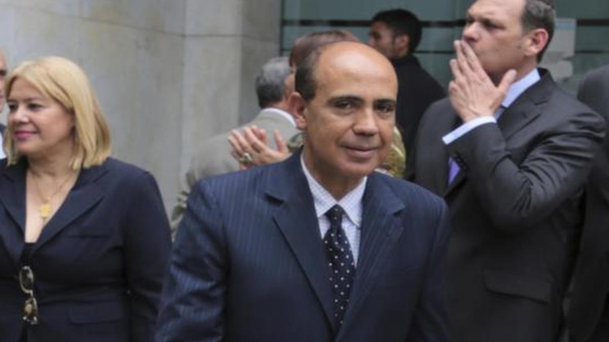 Foto del 21 de julio de 2017, los recién nombrados magistrados del Tribunal Supremo, Ángel Zerpa, y Zuleima González, se marcharon después de su ceremonia de juramento en Caracas, Venezuela.