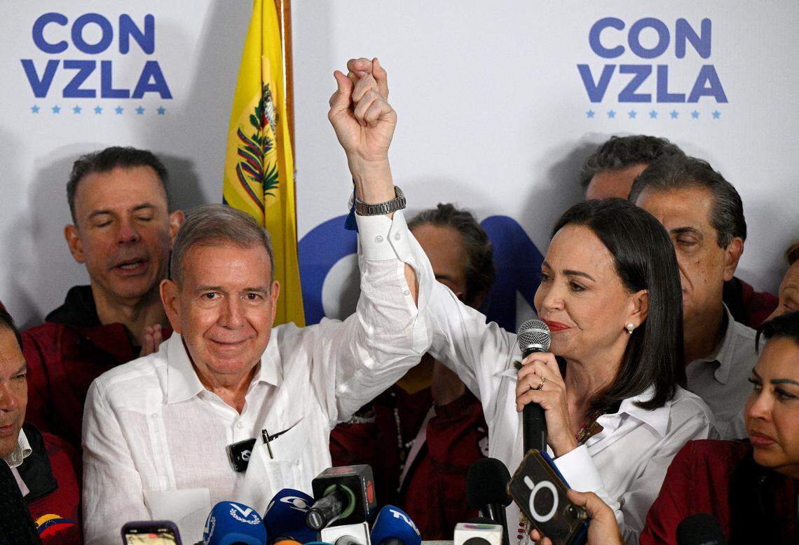 Venezuelan opposition leader Maria Corina Machado speaks to the media, accompanied by opposition presidential candidate Edmundo Gonzalez Urrutia, following the results of the presidential election in Caracas on July 29, 2024.