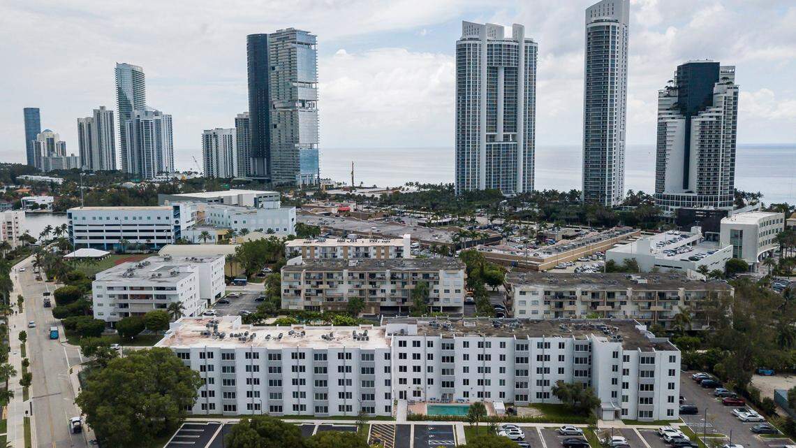 Aerial view of the Caribbean Breeze Condominium, bottom-center, on Monday, July 29, 2024, in Sunny Isles Beach, Fla. Some residents at the condominium pay over $800 a month in homeowners association fees, which has increased year after year.