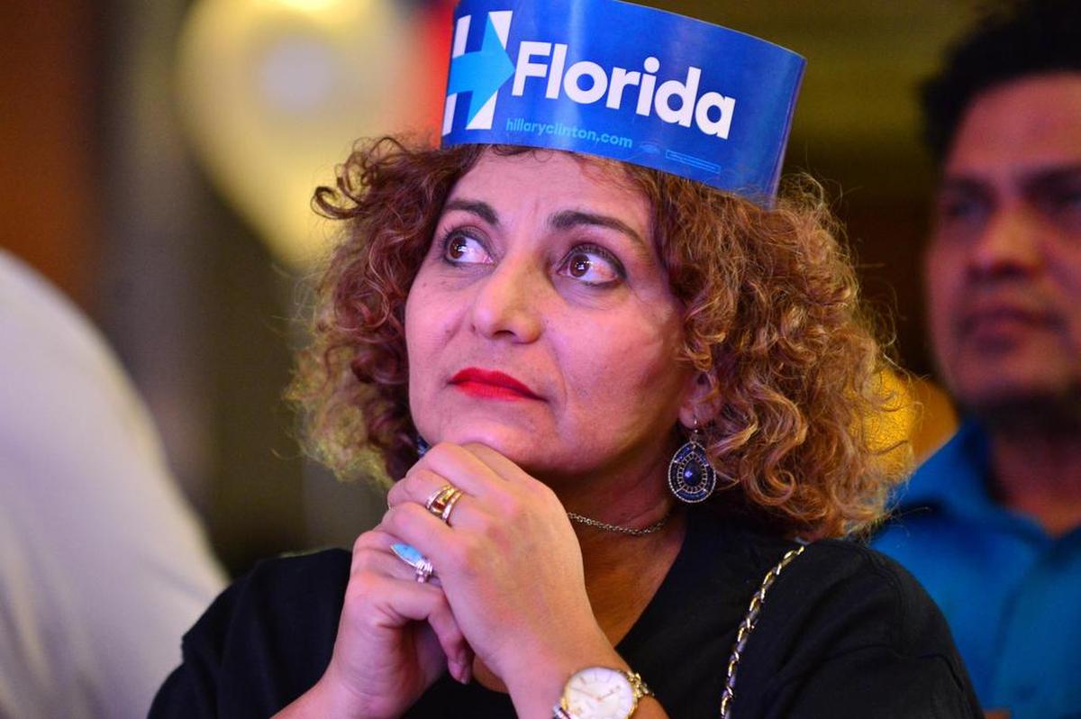 Supporters of Hillary Clinton follow Election Day results at the EB hotel in Miami in 2016.