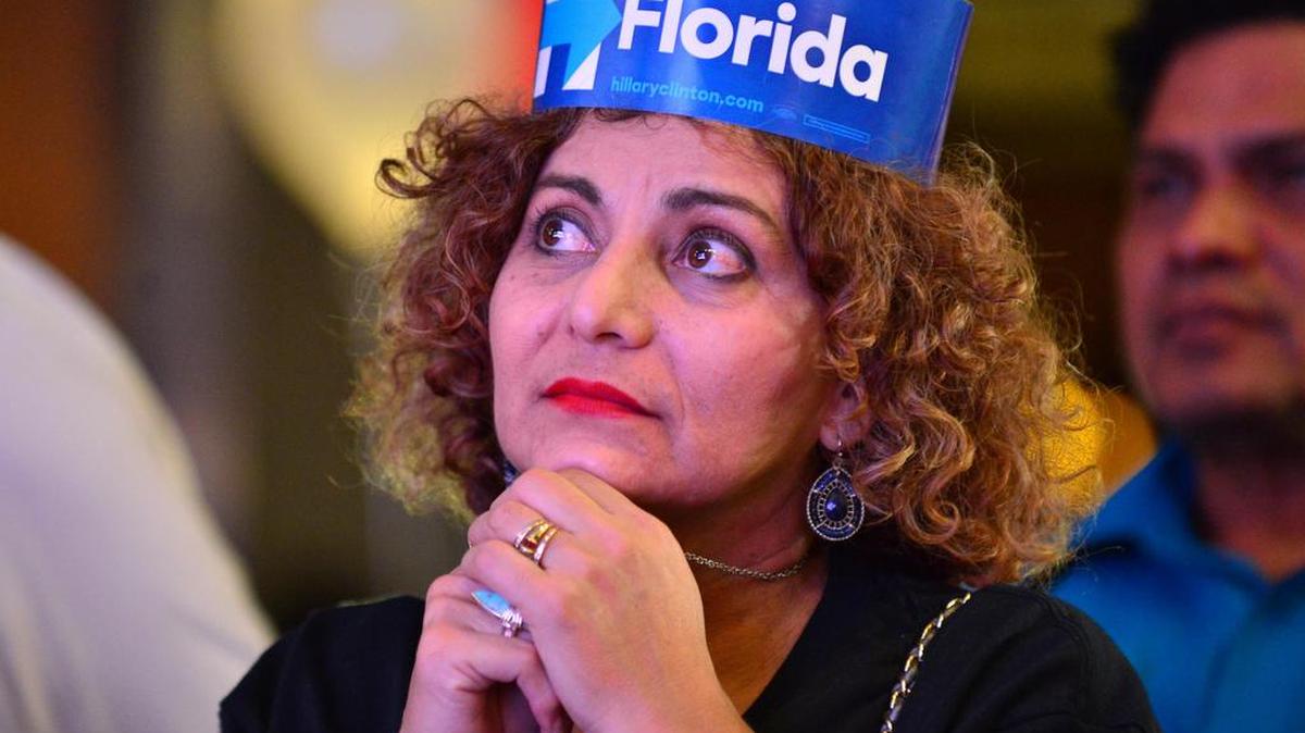 Supporters of Hillary Clinton follow Election Day results at the EB hotel in Miami in 2016.