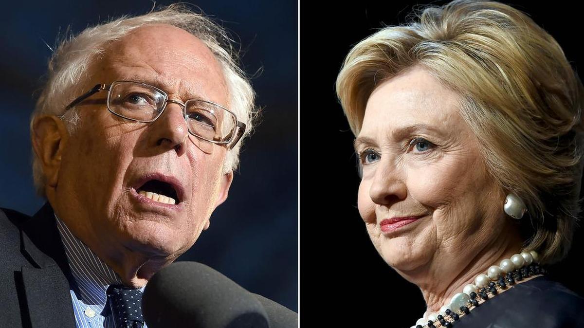 Los precandidatos demácratas Bernie Sanders (izq.) y Hillary Clinton.