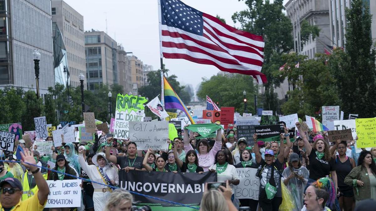 Abortion-rights activists march to the White House during a rally on July 9. (AP Photo/Jose Luis Magana)