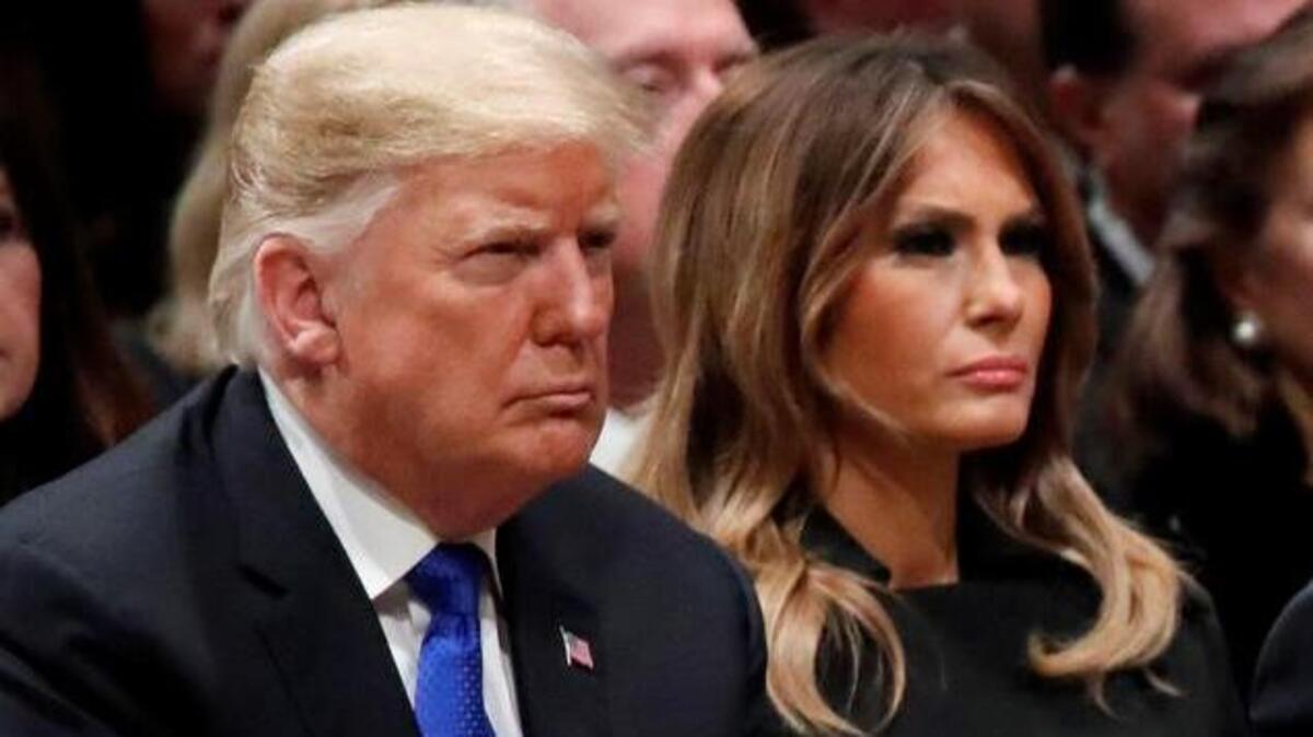 El presidente estadounidense, Donald Trump, su mujer y primera dama, Melania Trump, asisten al funeral del ex presidente estadounidense George H. W. Bush, en Washington DC (Estados Unidos), el 5 de diciembre de 2018.