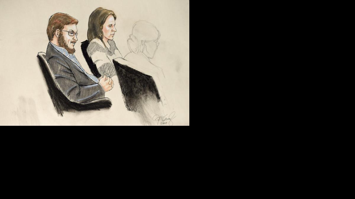 
Ilustracion judicial que muestra al acusado de asesinato James Holmes (izq.) junto a la abogada Tamara Brady (cen) durante el juicio celebrado en la audiencia del Condado Arapahoe, en Centennial, Colorado, el martes. 
