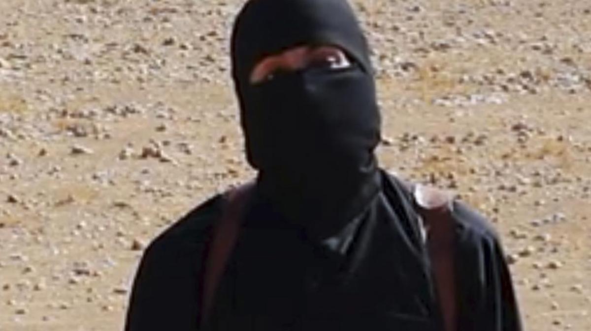 Esta foto sin fecha muestra un fotograma de un video difundido el viernes, 03 de octubre 2014, por militantes del Estado Islámico que pretende mostrar el militante que decapitó de taxista Alan Henning.
