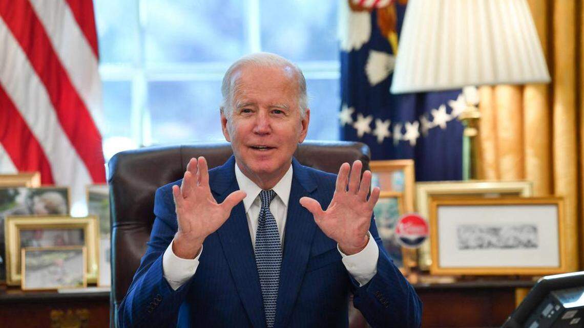 US President Joe Biden speaks after signing an executive order on delivering government services in the Oval Office of the White House in Washington, DC on December 13, 2021. (Photo by Nicholas Kamm / AFP) (Photo by NICHOLAS KAMM/AFP via Getty Images)