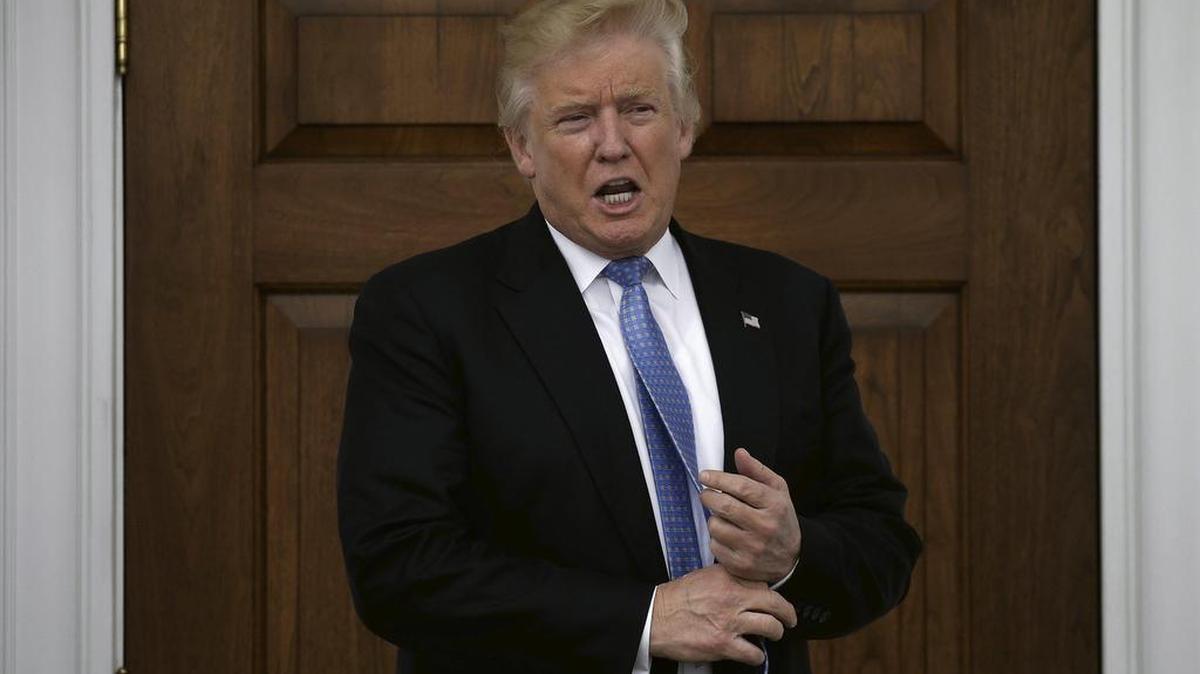 Fotografía de archivo tomada el 20 de noviembre de 2016 que muestra al presidente electo de Estados Unidos, Donald Trump, en el Club Internacional de Golf Trump en Bedminster (Estados Unidos).