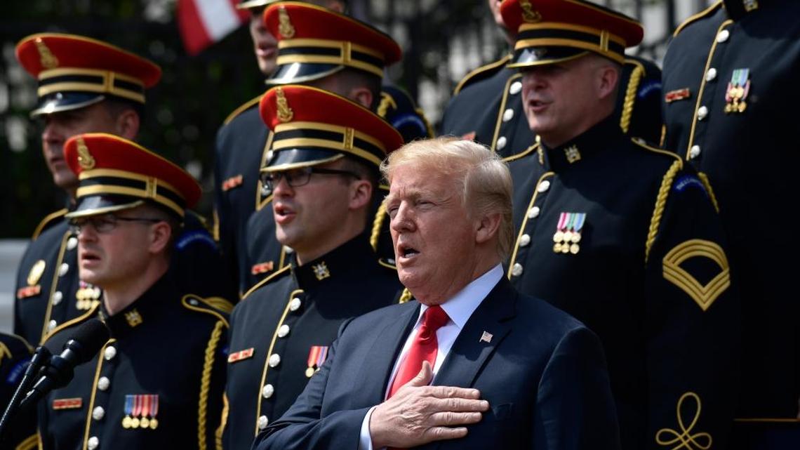 President Donald Trump participates in a "Celebration of America" event on the South Lawn of the White House in Washington on Tuesday. Trump quickly scheduled the event with military bands after canceling a visit with the Philadelphia Eagles as he stoked fresh controversy over players who protest racial injustice by taking a knee during the national anthem.