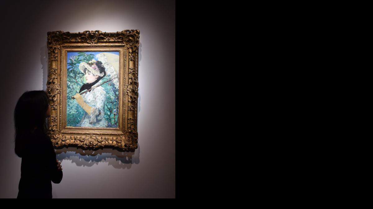 <cutline_leadin>La pintura</cutline_leadin> es un retrato de perfil de la actriz Jeanne Demarsy paseando con una sombrilla.<252>