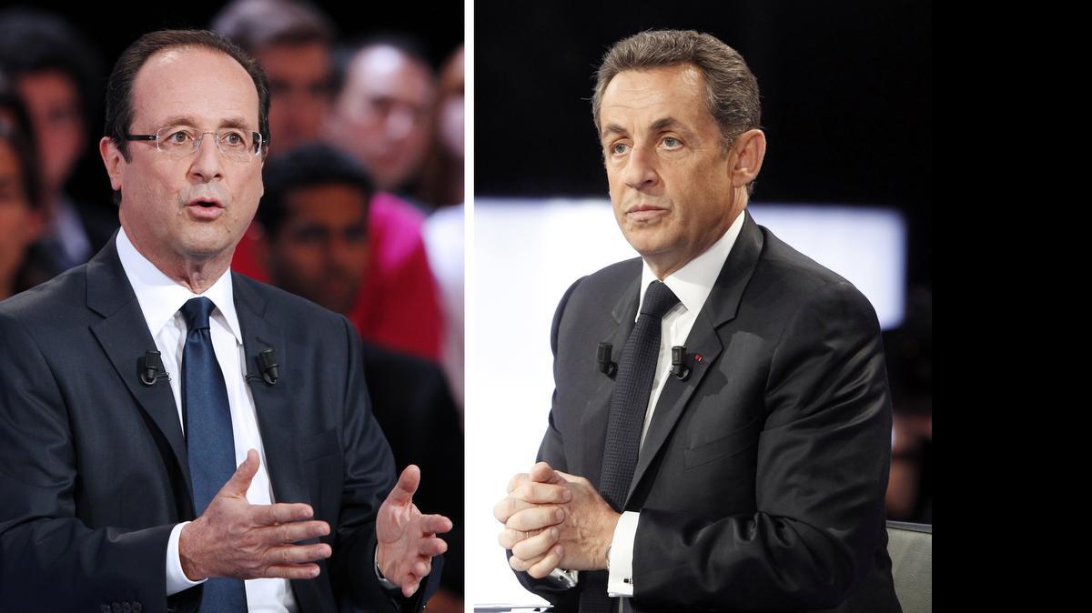 
Nicolas Sarkozy (der.) y François Hollande 

