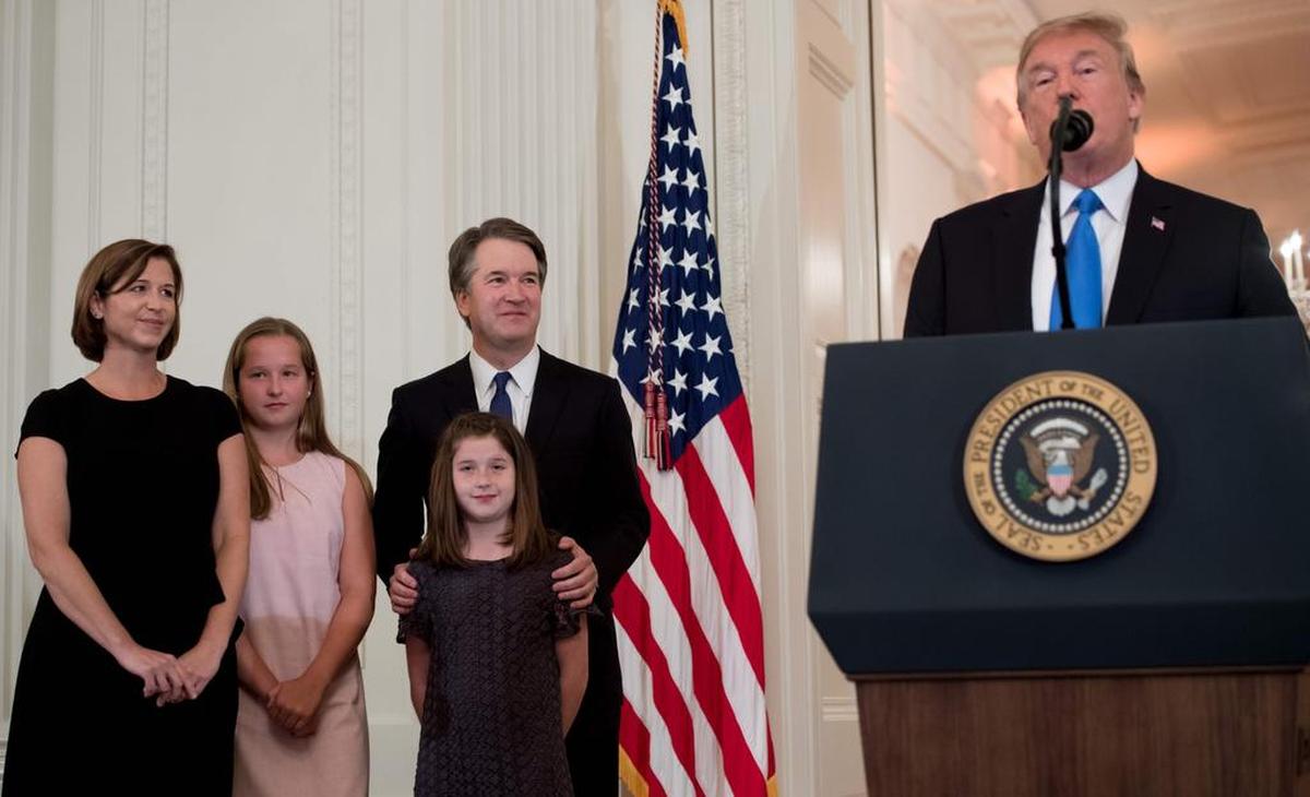 US President Donald Trump (R) announces US Judge Brett Kavanaugh (C) as his nominee to the Supreme Court in the East Room of the White House on July 9, 2018 in Washington, DC.  / AFP PHOTO / SAUL LOEBSAUL LOEB/AFP/Getty Images