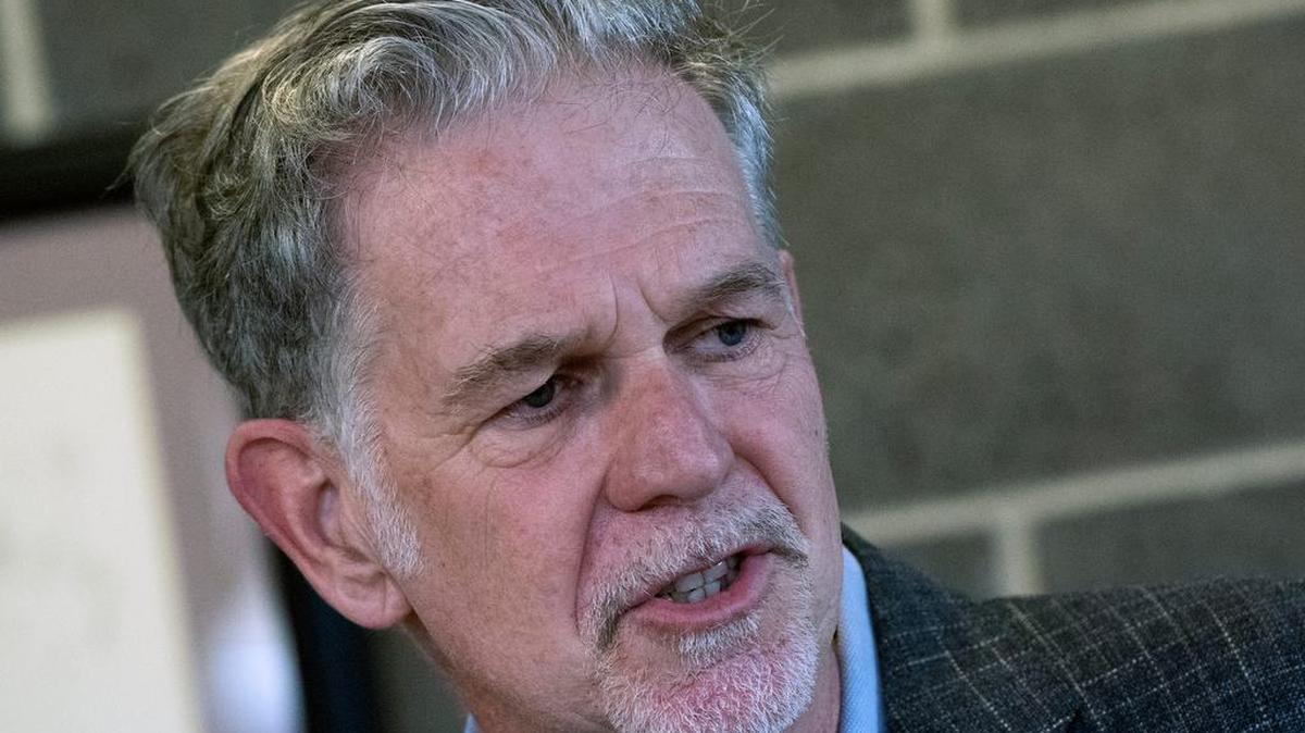 Netflix CEO Reed Hastings, right, discusses the $10 million donation he and his wife film producer Patricia Quillin have made to Tougaloo College in Jackson, Miss., Monday, Feb. 21, 2022. Tcl Tougaloo 05