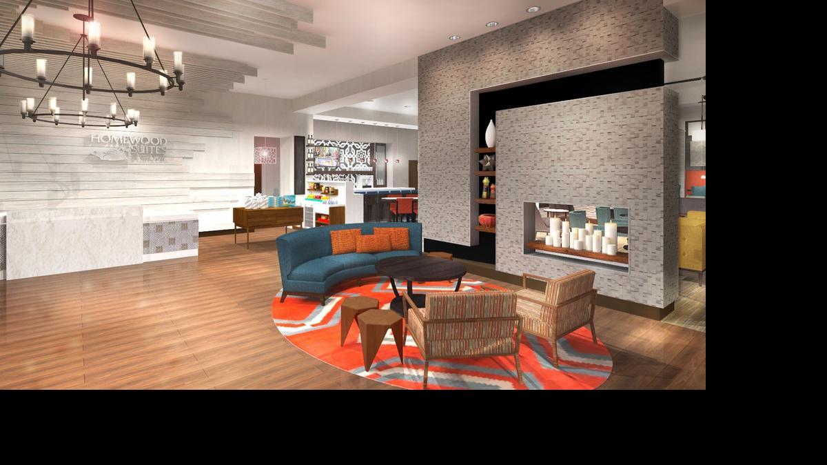 
Una representación del área de la recepción de un hotel de Homewood Suites para América Latina.

