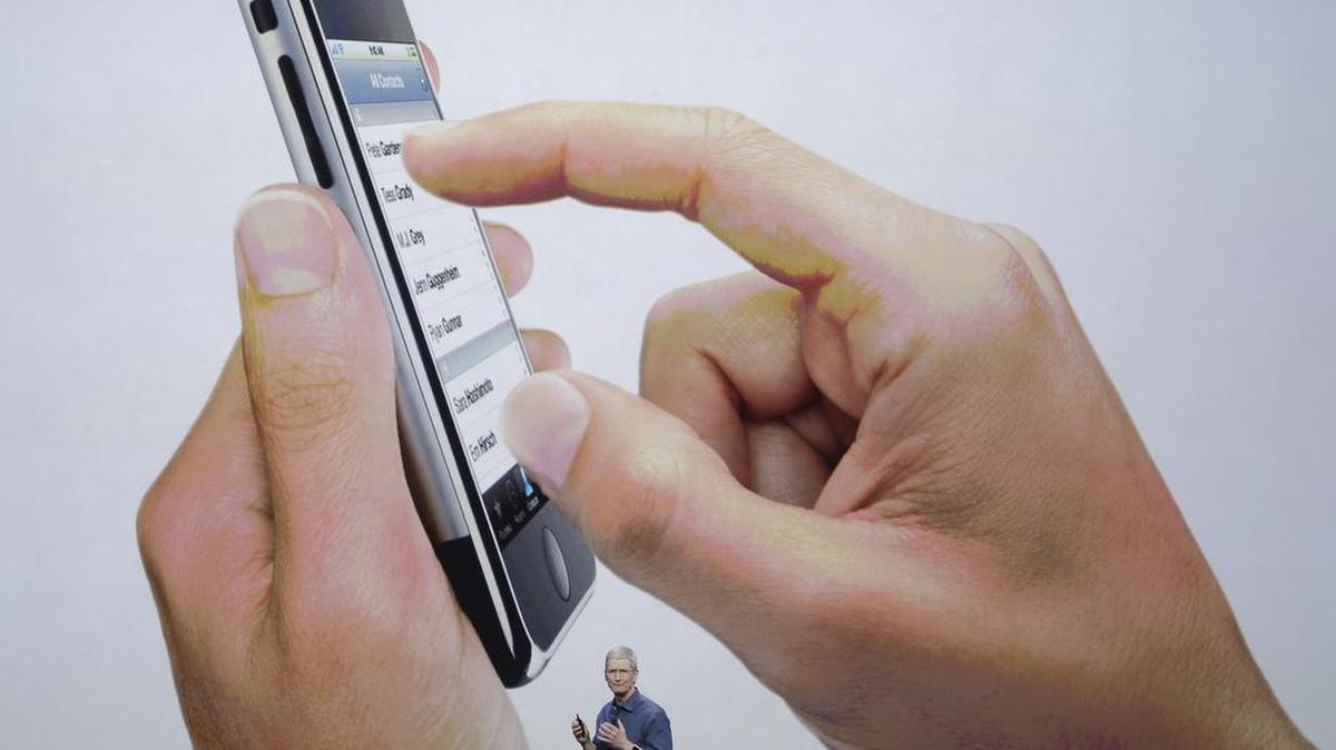 
En esta foto de archivo, Tim Cook habla en el lanzamiento de nuevos procutos de Apple en Cupertino, California.


