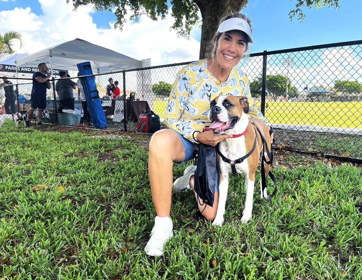Teresa Mejides Pérez y su perra, Roxy, de 3 años, fueron de las primeras en conocer el parque para perros que se inauguró en Goodlet Park, en Hialeah, el 9 de septiembre