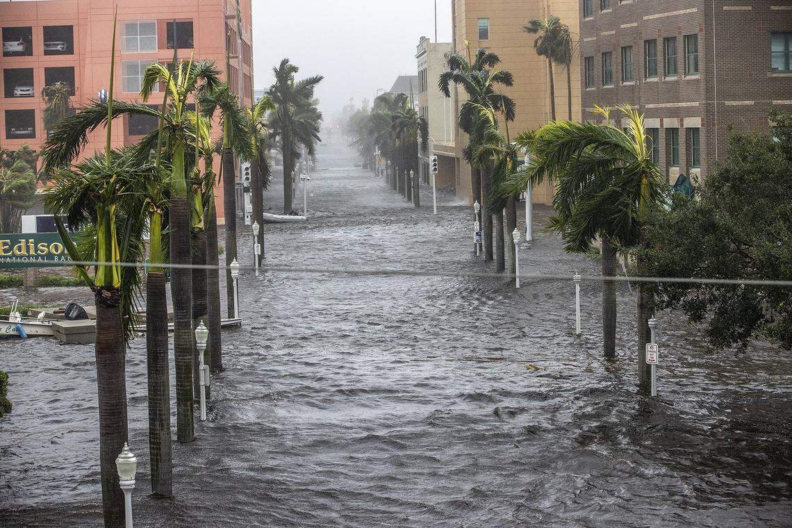 The streets of Fort Myers during coastal flooding from Hurricane Ian last year..