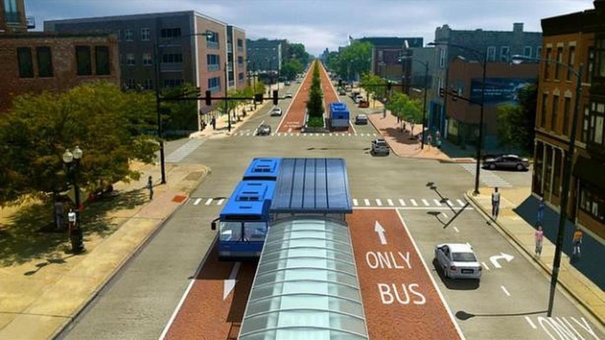 
Un boceto de como sería uno de los sistemas de Tránsito Rápido o Bus Rapid Transit (BRT) en un futuro cercano. En esta representación las sendas exclusivas de los autobuses y las estaciones se ubicarían en la mitad de la calle.
