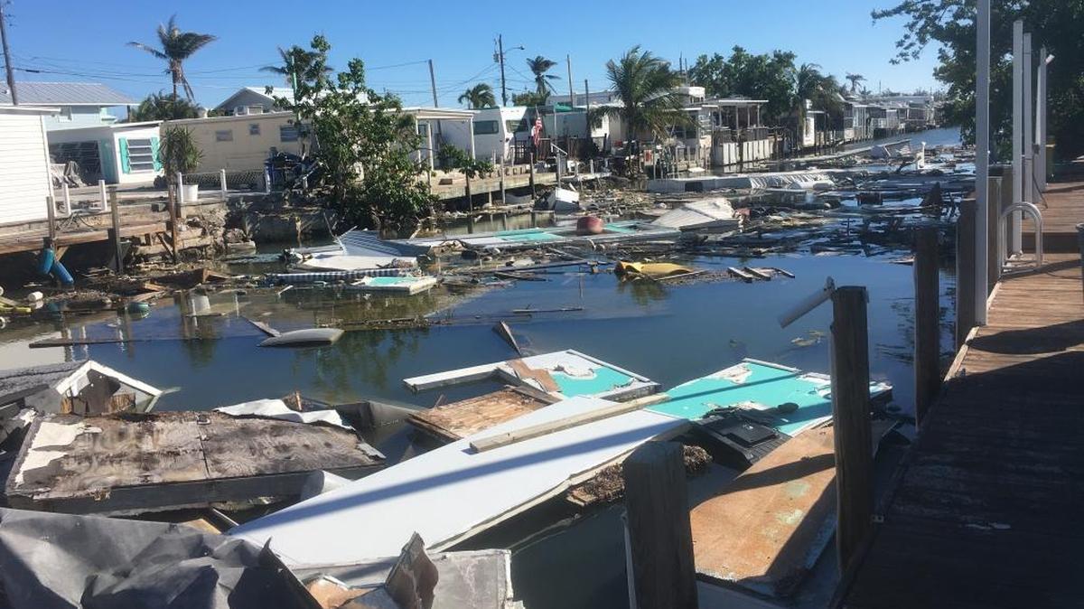 Este canal en el complejo de condominios Key by the Sea en Marathon está lleno de escombros que dejó el huracán Irma en septiembre pasado.