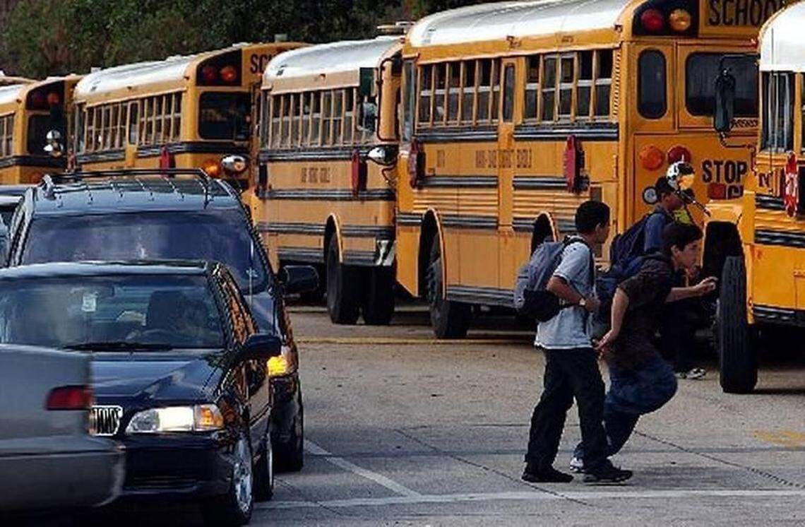 Drivers, kids and school buses, seen here in a file photo from 2018. A new survey says Florida had an 82% high school graduation rate in 2017, not high enough to help push the state into the Top 10 smartest in the U.S.