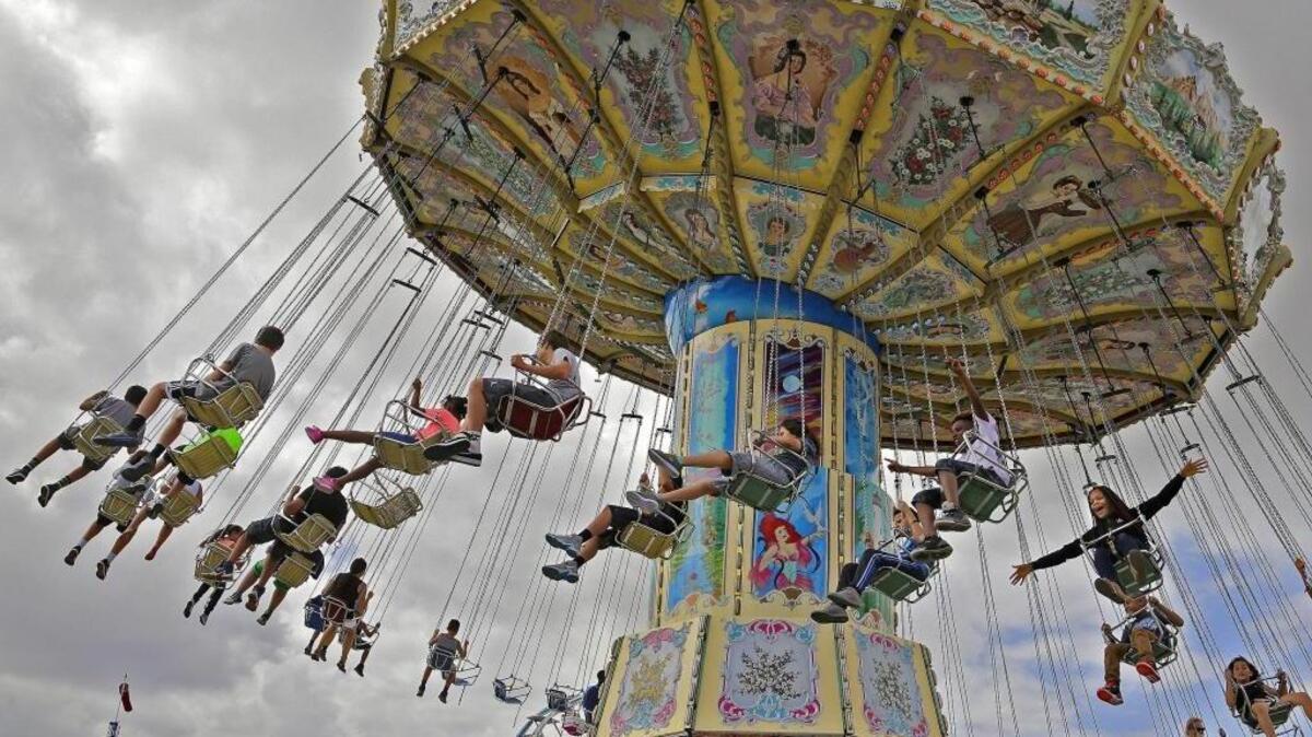 Los asistentes a la Feria de la Juventud de Miami se divierten de lo lindo este domingo.
