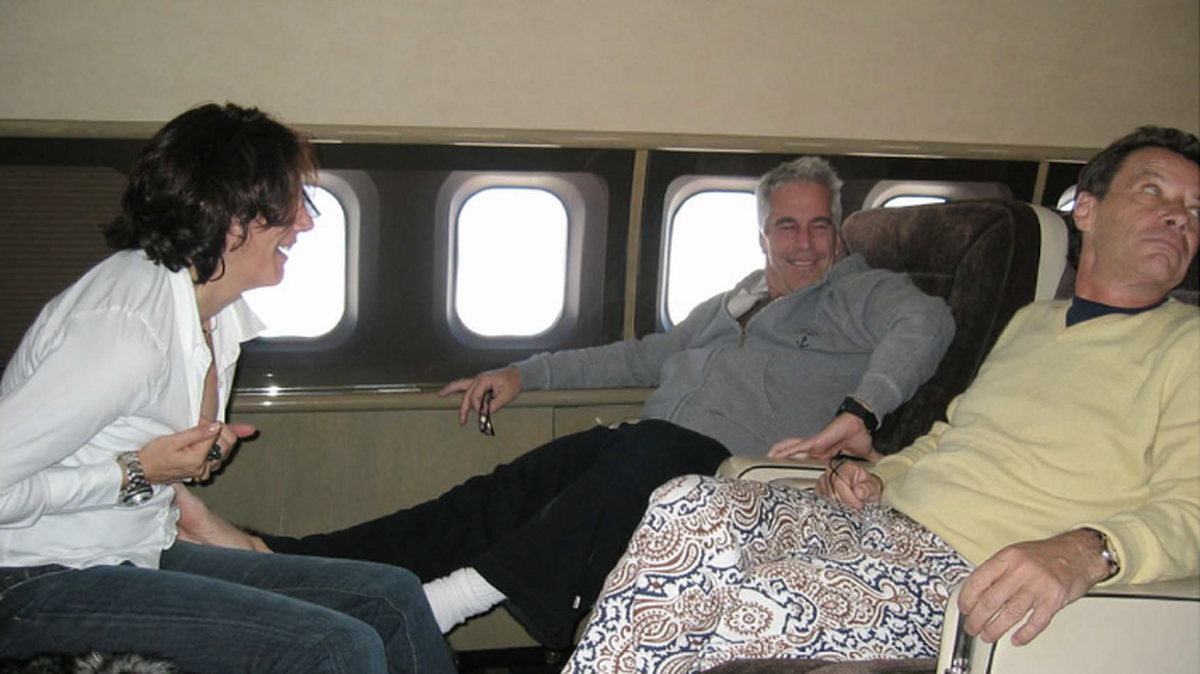 Undated photo of Jeffrey Epstein, Ghislaine Maxwell and Jean-Luc Brunel aboard a private jet of Epstein’s.