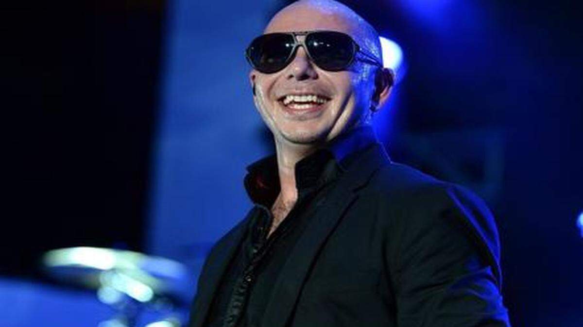 
El artista Pitbull sería la versión de Dick Clark de la Ciudad Mágica compitiendo con la gélida Times Square.

