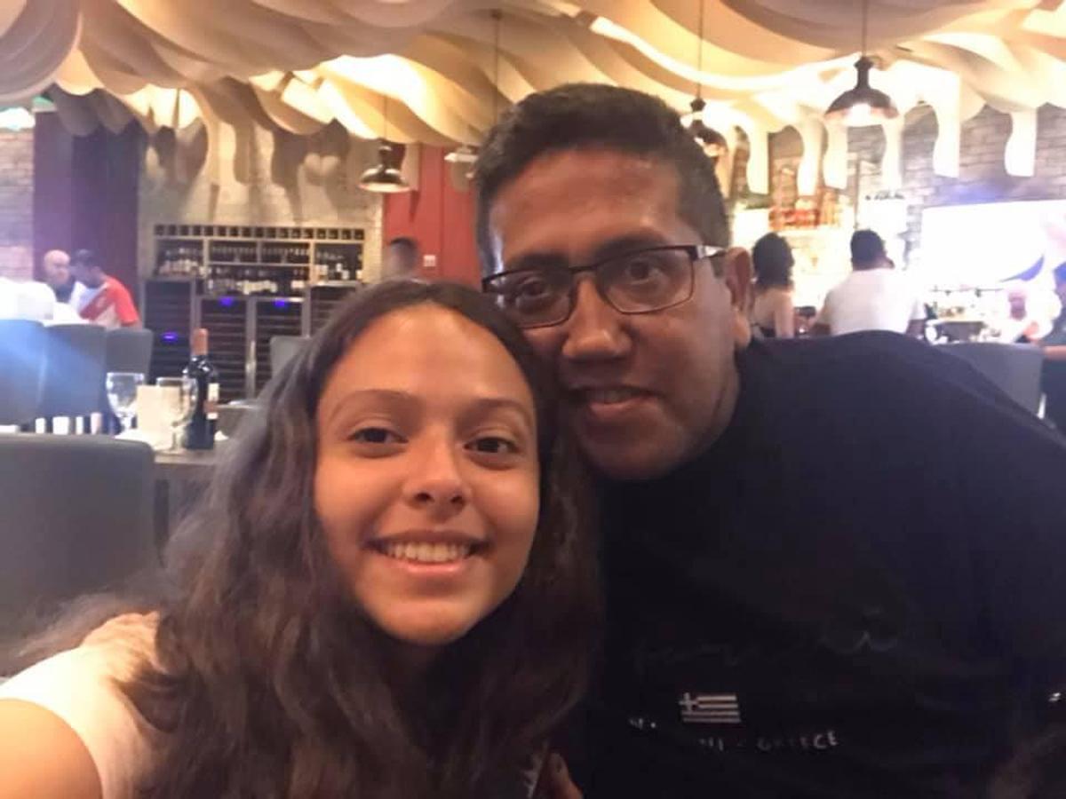 Enrique Flor with his daughter Mariana. Flor was known for his dedication as a father.