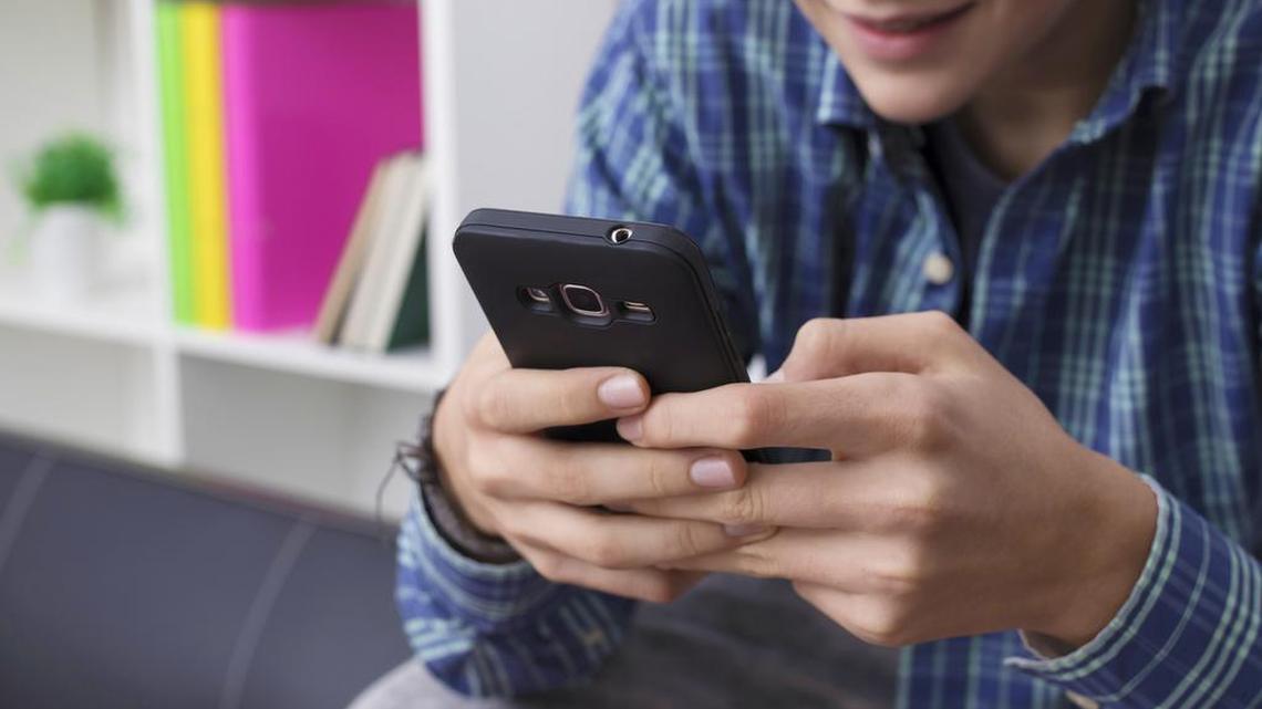 Here’s what you should do if you’re handing down an old smartphone of yours to your kid. (Dreamstime/TNS)