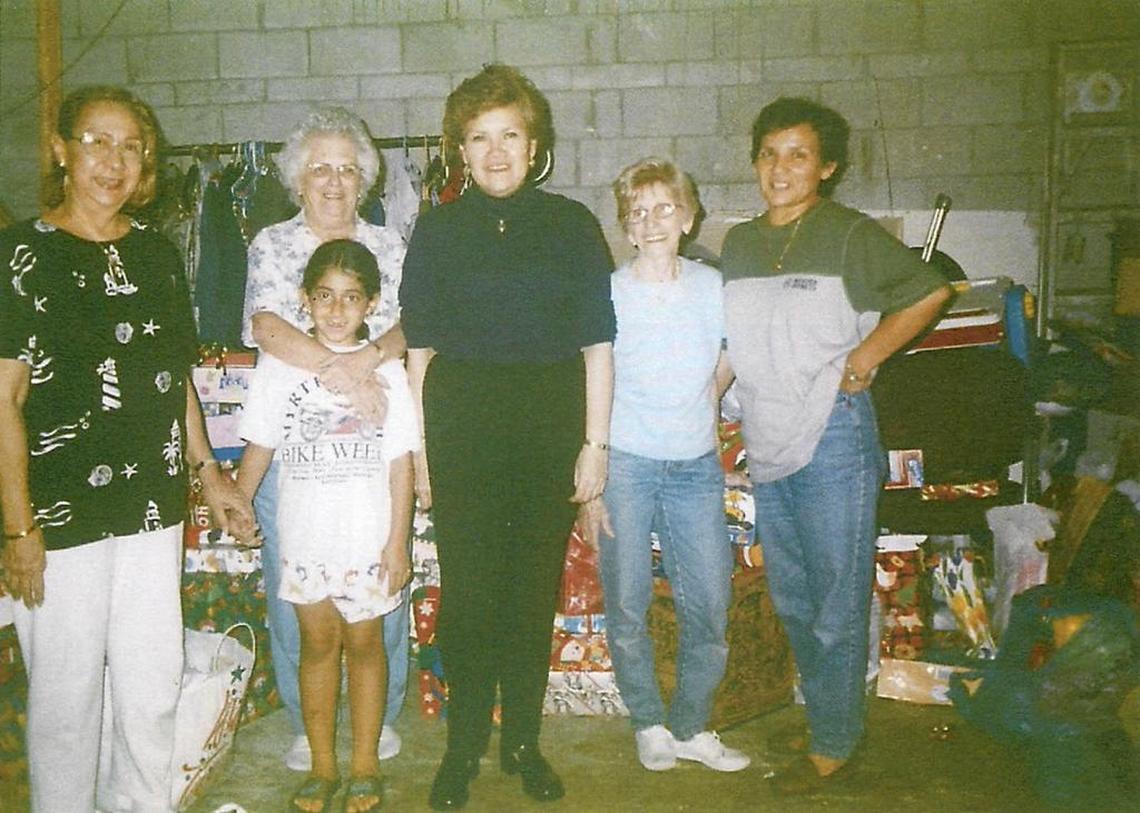 Norma Borgoño, far right, participates in a Christmas event at her church.