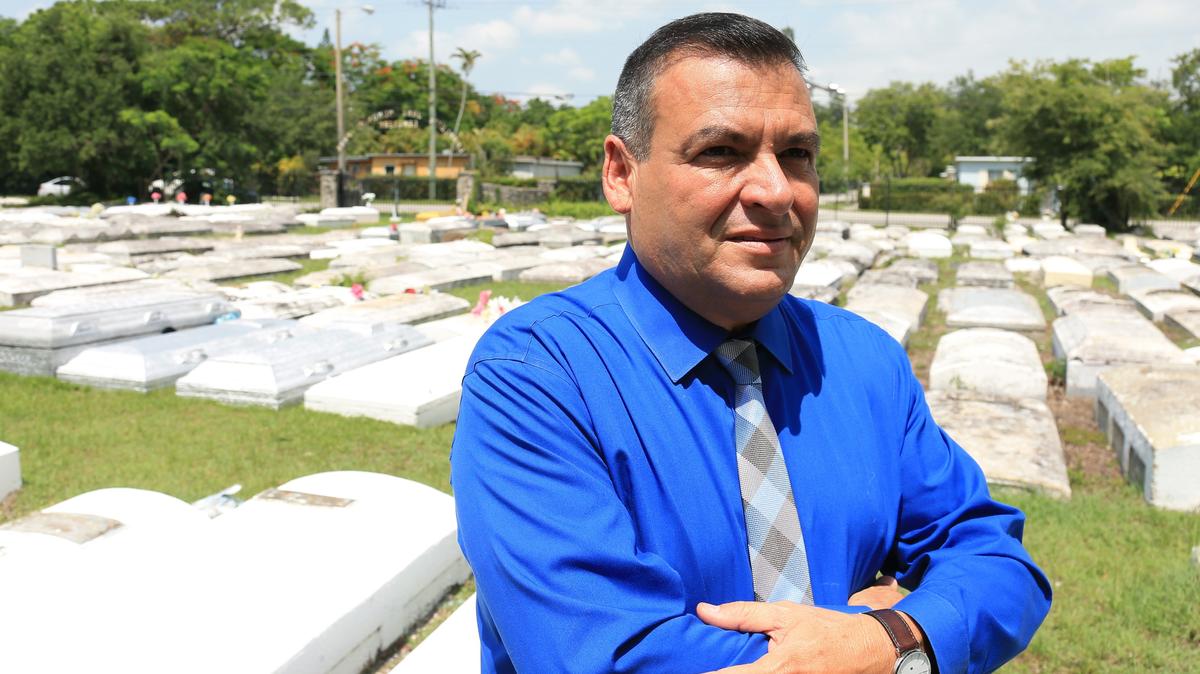 Carlos Joel Bencomo, president of the Bencomo Foundation, in the Charlotte Jane Memorial Park Cemetery in June 2019.