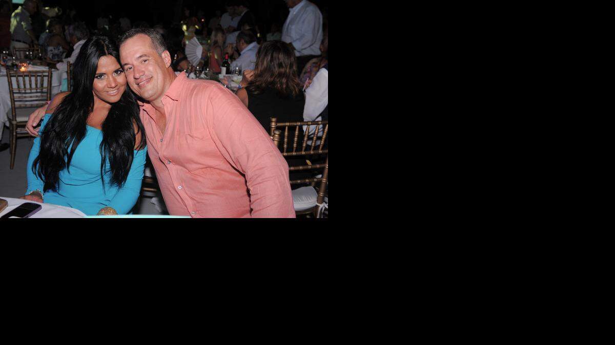 
La modelo puertorriqueña María del Pilar Rivera y el ejecutivo cubanoamericano Albert Rodríguez durante los días en que sostenían un romance.
