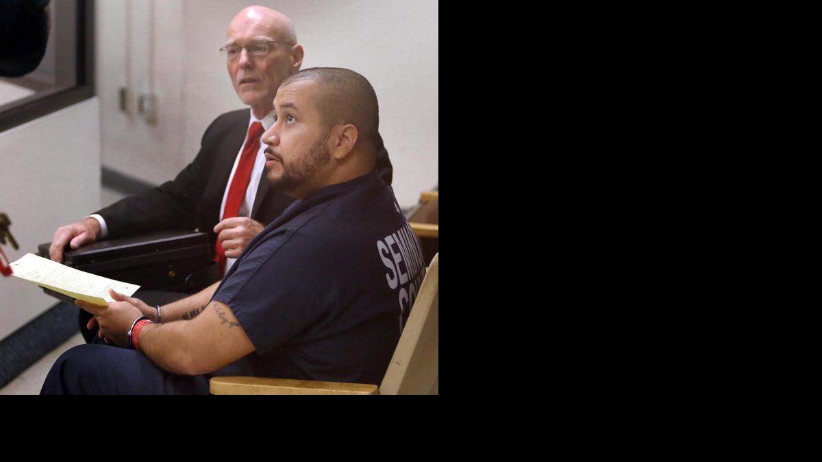 
George Zimmerman (der.), sentado con su abogado Don West durante una presentación preliminar en la corte del Condado Seminole, el sábado.



