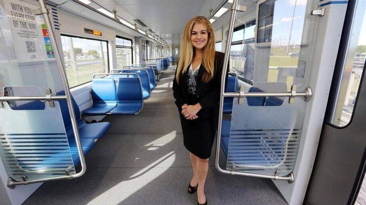 Alice Bravo, Miami-Dade’s outgoing transit director, standing in a new Metrorail car, part of a fleet replacement that reduced the breakdowns and delays  that disrupted the rail system in 2017 and 2018. Bravo announced her departure from the county for a private-sector job on Dec. 18, 2020. 